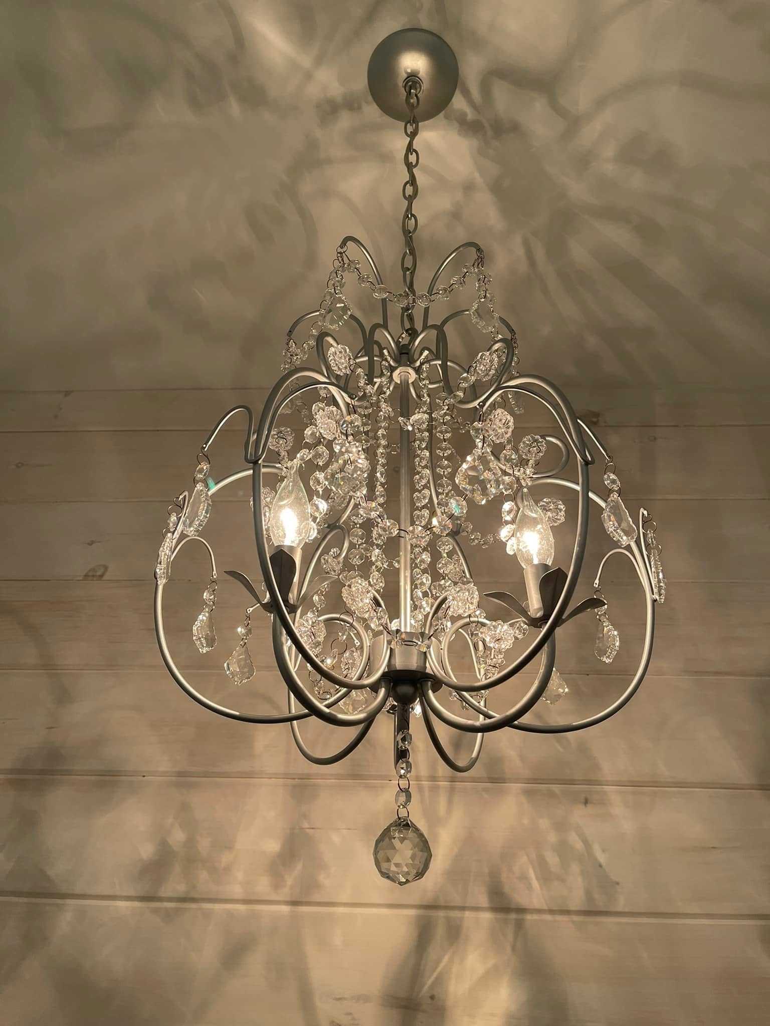 Crystal chandelier installation in a North Adams area home